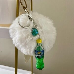 White Fluffy Keychain with Sprite Bottle Charm